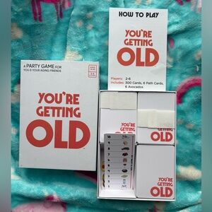 You're Getting Old Party Game - White with Orange Text